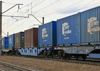 Kazakh freight train transports containers.