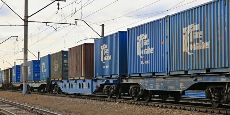 Kazakh freight train transports containers.