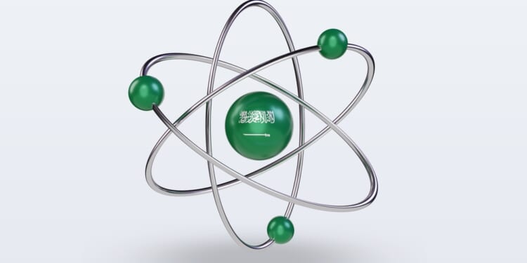 Saudi Arabia flag on nuclear energy atom