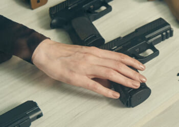 Woman Gets Body-Slammed in Store While Allegedly Trying to Steal Pistol