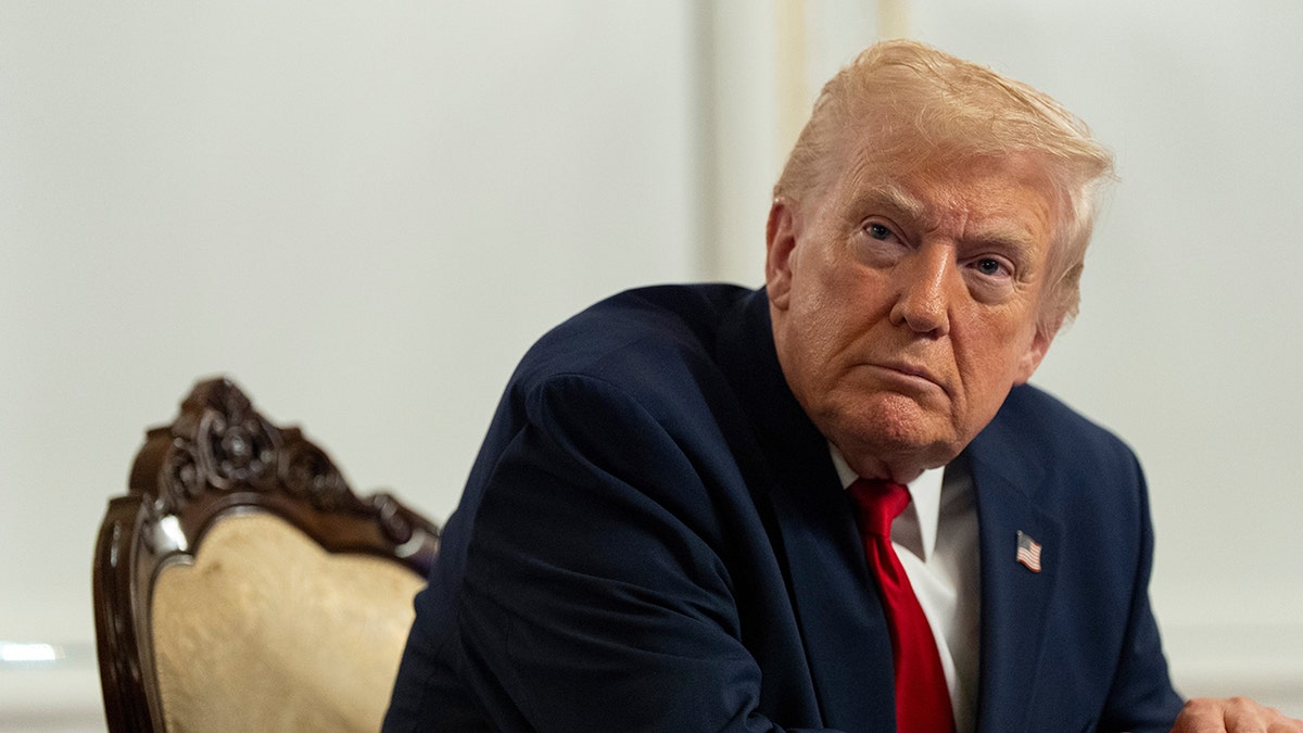 Donald Trump speaks to reporters