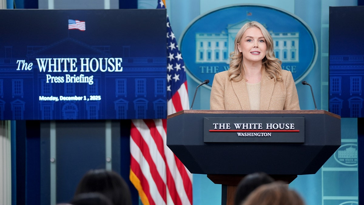 Karoline Leavitt addresses reporters from the White House podium.