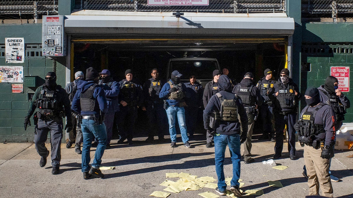 Law enforcement officers gather