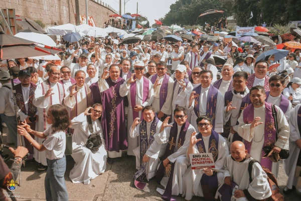 Protesters, including priests and seminarians, gather for a rally against corruption in Manila on Nov. 30, 2025. Credit: Santosh Digal