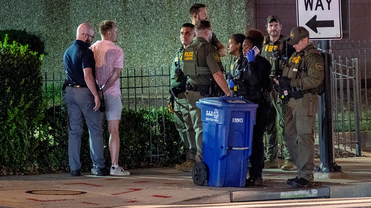 Law enforcement takes Sean Charles Dunn into custody in Washington, D.C.