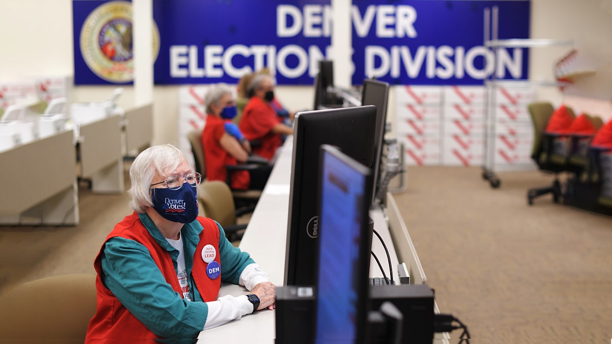 Poll workers wear masks at polling station ahead of Midterms