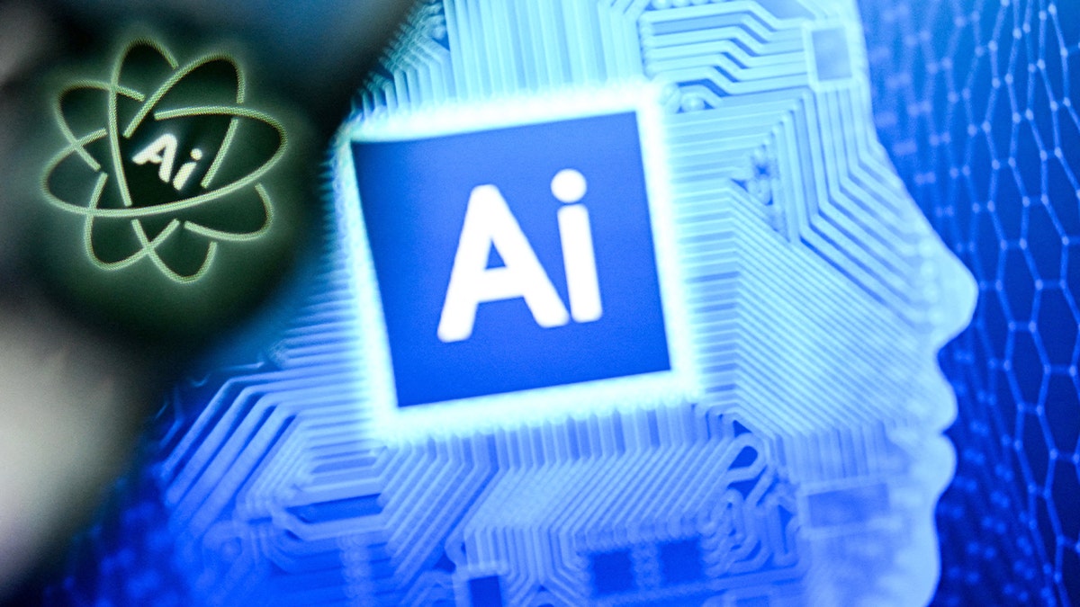 Laptop and smartphone display graphics related to artificial intelligence.