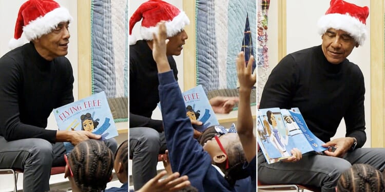Obama surprises Chicago students in Santa hat during library visit