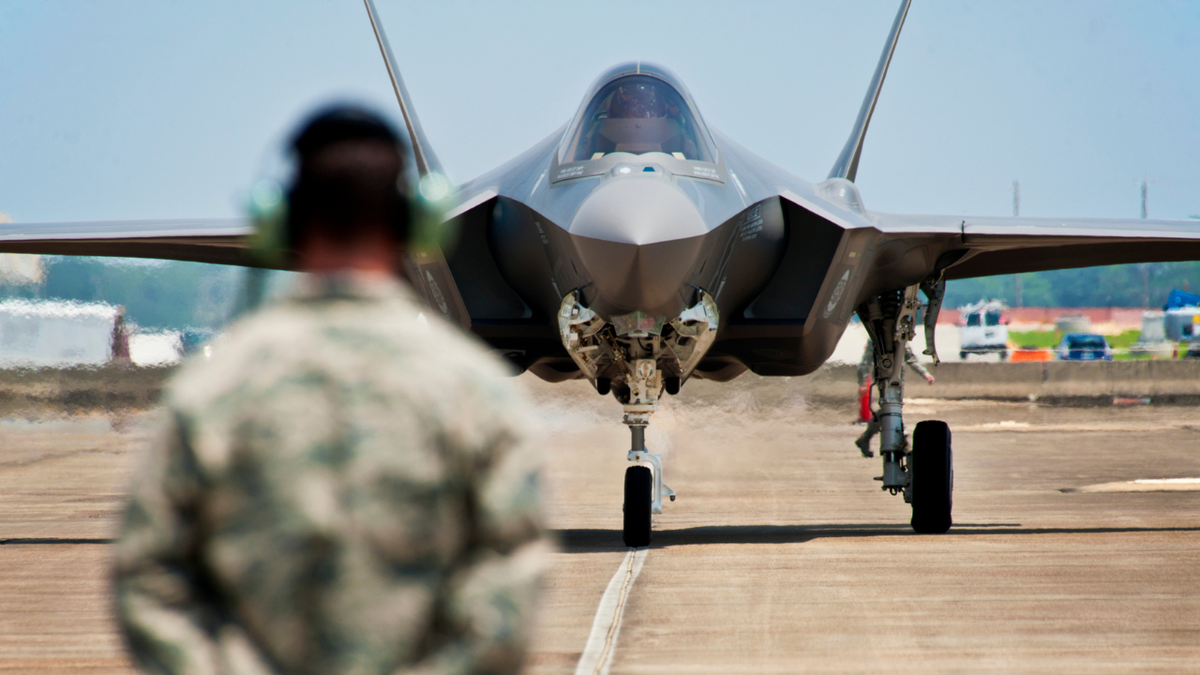 An F-35A is seen approaching on a flight line at Eglin Air Force Base in Florida