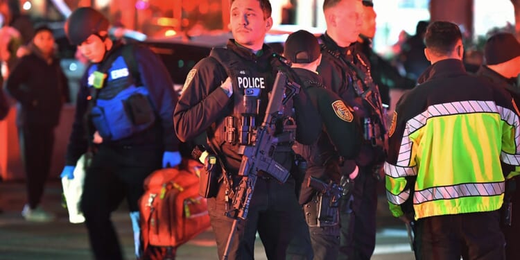 Trump calls Brown University shooter 'animal' as manhunt continues