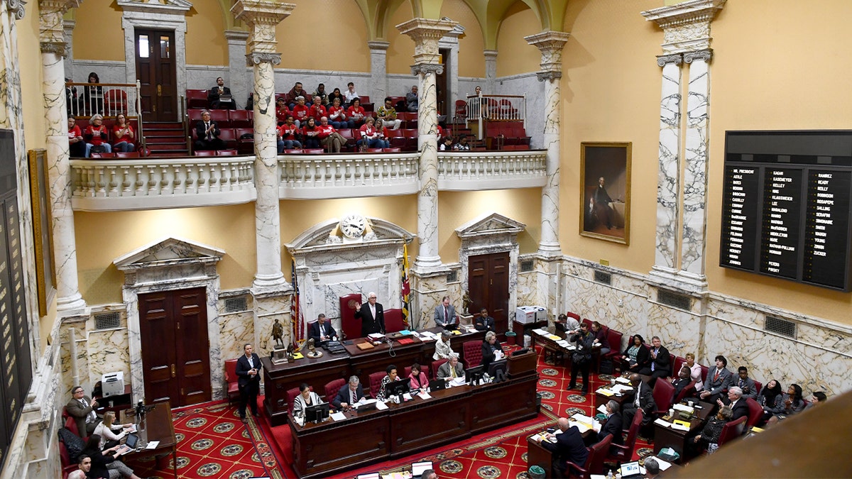 Elected officials acknowledge a visiting youth group from the chamber floor during the session’s final day.