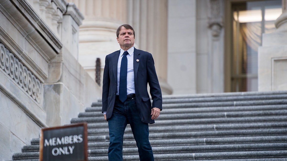 Congressman Mike Quigley comes down steps of House of Representatives
