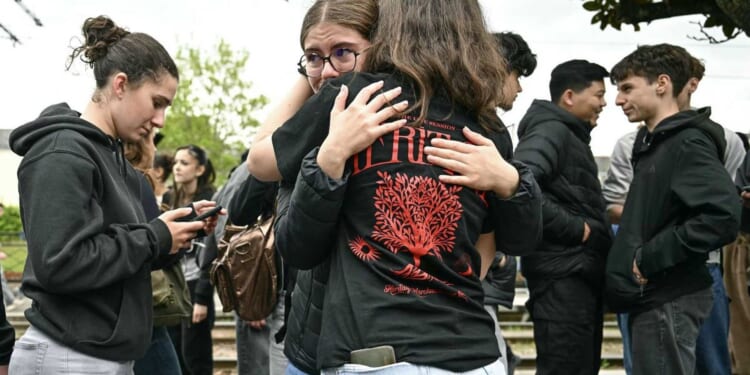 High school student allegedly kills classmate with scissors outside science class