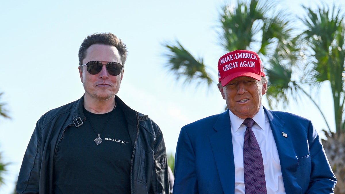 Musk and Trump walking