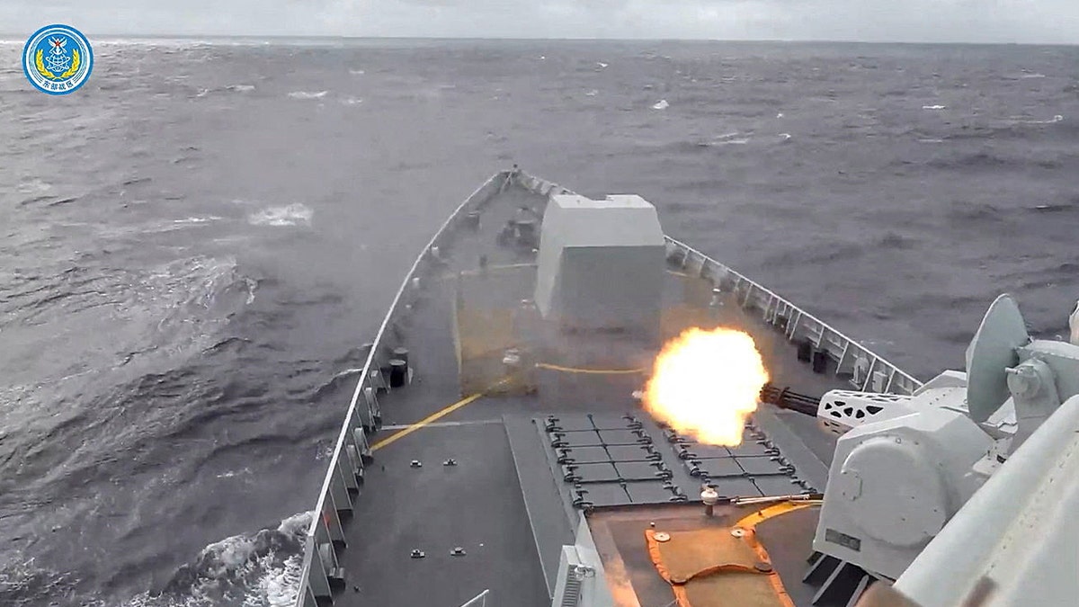 A ship fires a weapon during drills east of Taiwan, in this screenshot from a video released by the Eastern Theatre Command of China's People's Liberation Army (PLA) on December 29, 2025.