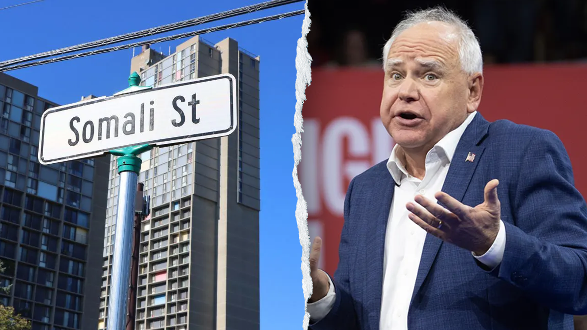 Tim Walz beside a street sign reading "Somali Street"