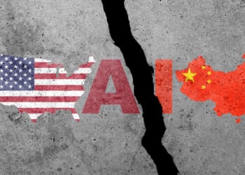 USA and China flags on a concrete wall. China and US artificial intelligence or AI competitions