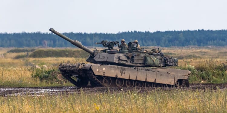 An M1 Abrams tank in mud.