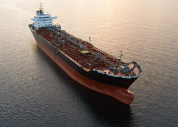 An oil tanker at sunset.