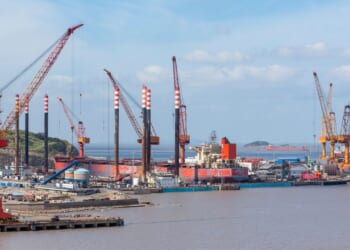 A Chinese shipyard during the daytime.