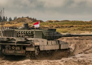 A Leopard 2 tank in rough terrain.