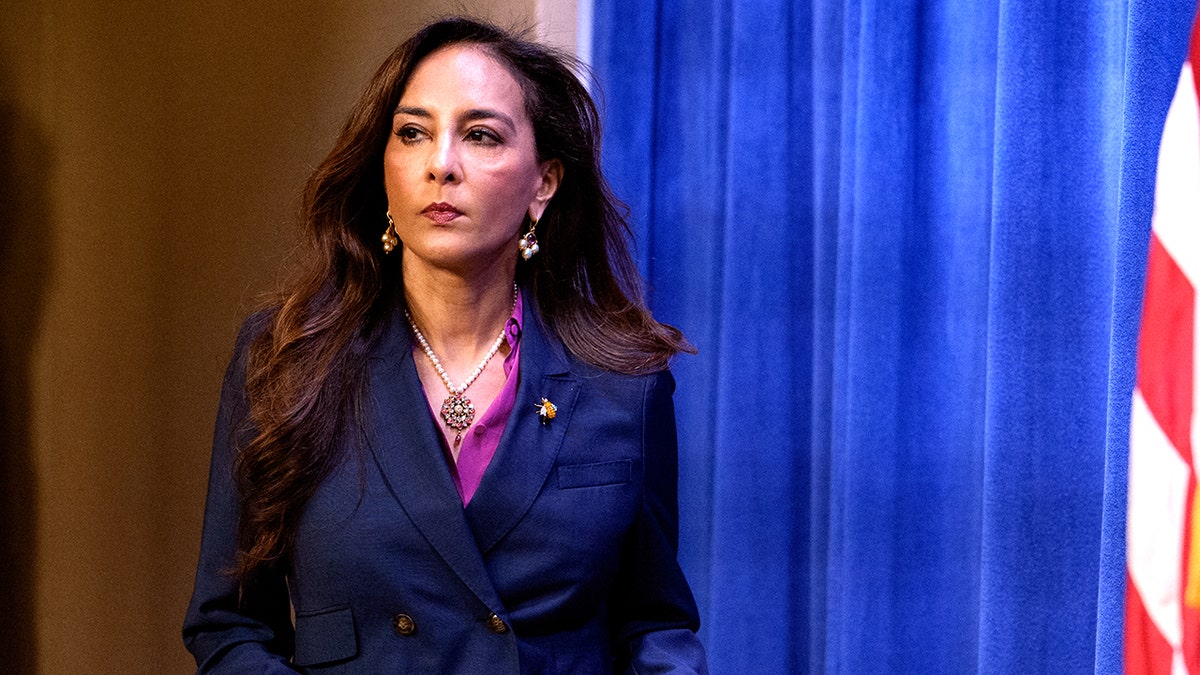 Harmeet Dhillon walking.