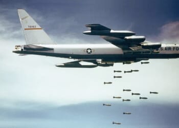 A US Air Force B-52 dropping bombs on Vietnam.