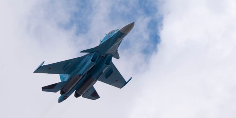 A Russian Su-30 fighter jet in flight.
