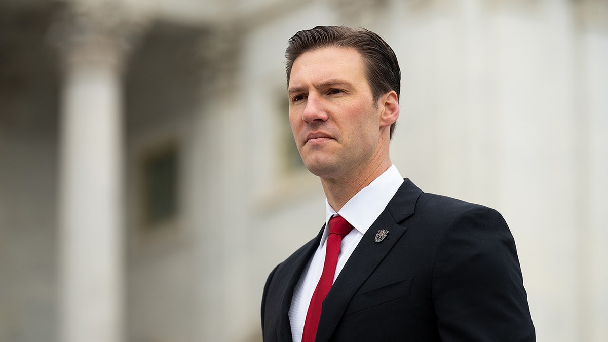 Pat Harrigan walks down Capitol steps