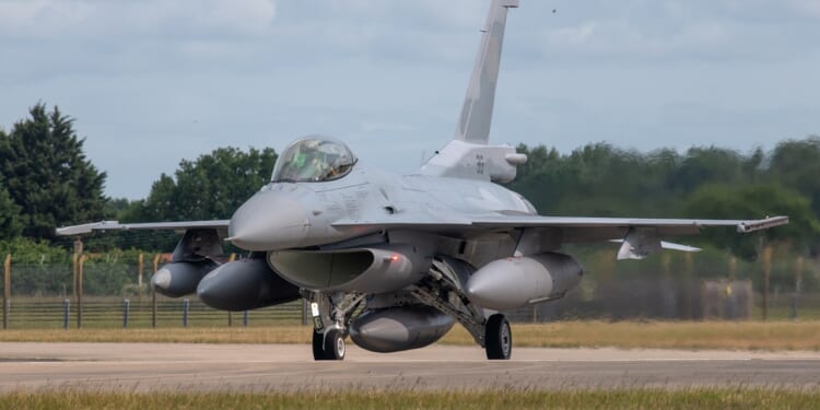 An F-16 Fighting Falcon on the tarmac.