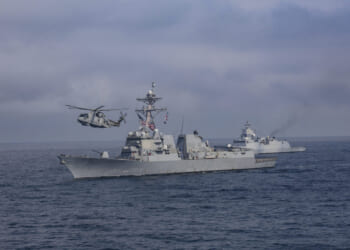 The Arleigh Burke class guided-missile destroyer USS Thomas Hudner (DDG 116), left, maneuvers alongside the Norwegian Royal Navy Fridtjof Nasen-class frigate HNOMS Otto Sverdrup (F312), right, while participating in exercise At-Sea Demonstration (ASD) / Formidable Shield (FS) 2025.