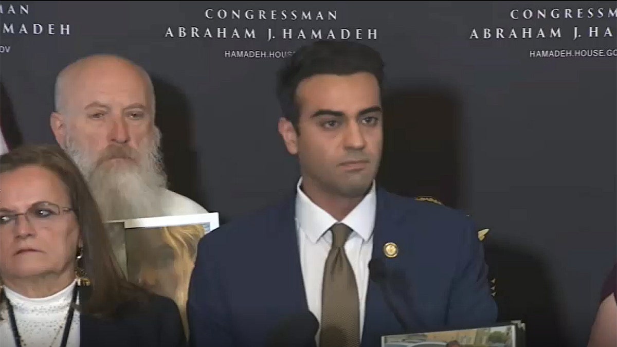 Congressman Abraham Hamadeh with two people next to him