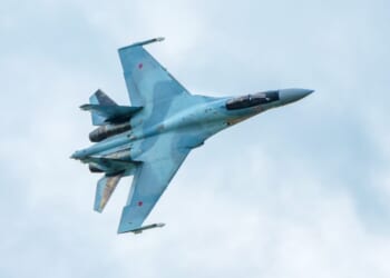 Modern Russian strike fighter Sukhoi Su-35 flying in sky. Military airplane of air force of Russia.