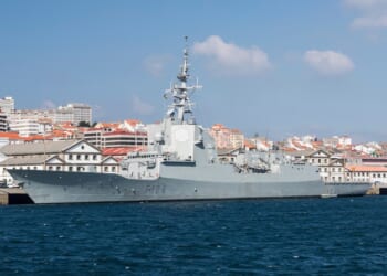A Spanish F-100 frigate in port.