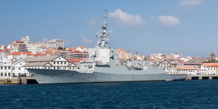 A Spanish F-100 frigate in port.