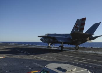 An F-35 preparing to take off from an aircraft carrier.