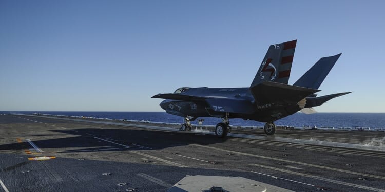An F-35 preparing to take off from an aircraft carrier.