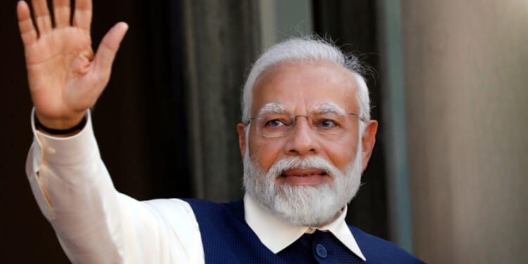 Narendra Modi appears at Paris event.