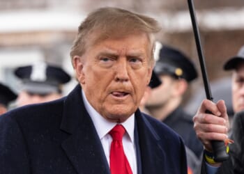 Donald Trump attends a funeral.