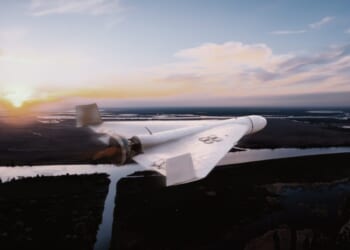 Russian military combat drone Shahed 131 flies over a forest, in Kherson river "Dnipro" Ukraine.