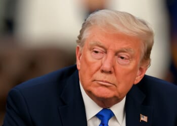 Trump looking away from the camera.