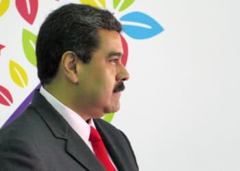 A sideways profile of Nicolas Maduro.