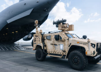 U.S. Airmen with 535th Airlift Squadron and Marines with 3rd Littoral Anti-Air Battalion, 3rd Marine Littoral Regiment, 3rd Marine Division, load a Marine Air Defense Integrated System, during a loading exercise onto a C-17A Globemaster III with the 535AS at Joint Base Pearl Harbor-Hickam, Hawaii, Oct. 24, 2025.