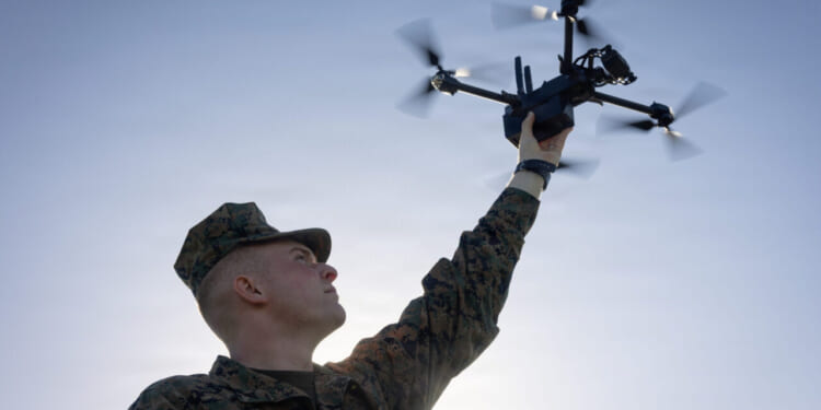 U.S. Marine Corps Lance Cpl. Zachary Voorhees, a small unmanned aircraft system operator with 2nd Battalion, 7th Marines, forward deployed under 4th Marine Regiment, 3rd Marine Division, operates a Skydio X2D during a small unmanned aerial systems training (sUAS) on Camp Hansen, Okinawa, Japan, Nov. 6, 2025.