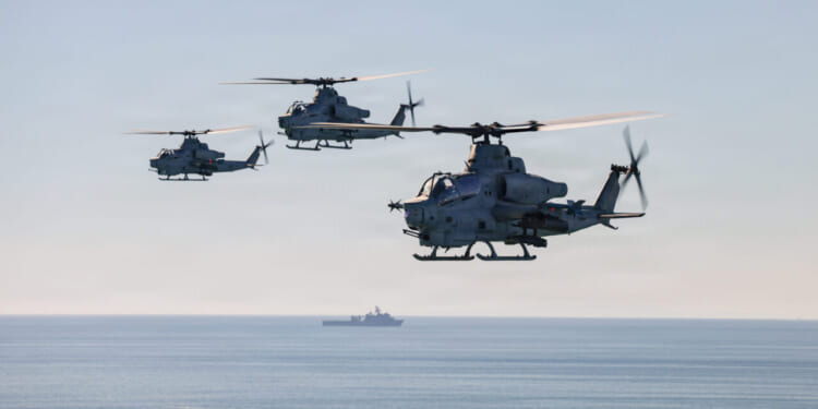 U.S. Marine Corps AH-1Z Vipers with Marine Light Helicopter Squadron 267, 3rd Marine Aircraft Wing, conduct flight operations in support of the Marine Corps 250th Birthday Amphibious Capabilities Demonstration at Marine Corps Base Camp Pendleton, California, Oct. 18, 2025.