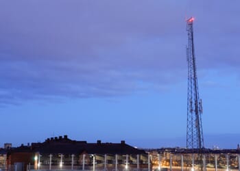 A Swedish radio tower at night.