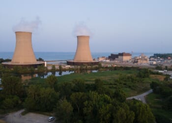 Newport, Michigan, USA - June 16, 2023 - Aerial shot of Enrico Fermi II nuclear energy power plant on Lake Erie