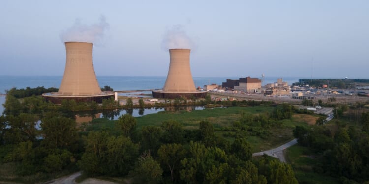 Newport, Michigan, USA - June 16, 2023 - Aerial shot of Enrico Fermi II nuclear energy power plant on Lake Erie