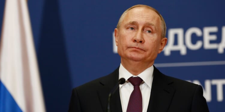 Russian president Vladimir Putin speaks at press conference during official visit to Serbia.