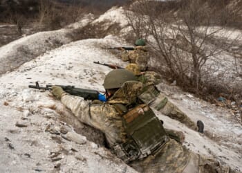 A group of Ukrainian soldiers in a trench.
